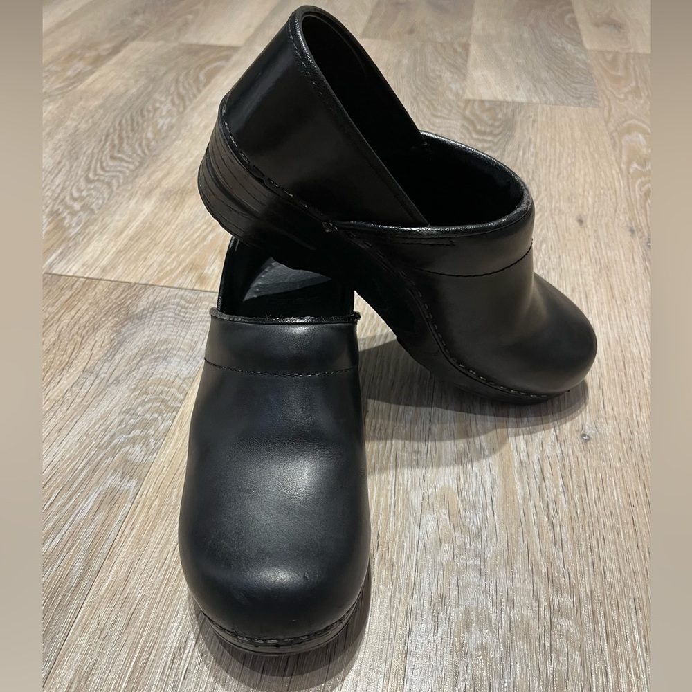 Dansko black professional clog size women's 38. Some wear.